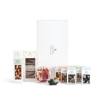 Luksus gavekurv fra Karamel Kompagniet med hygge tema, chokoladekarameller, lakridskarameller og chokoladeovertrukne saltkarameller